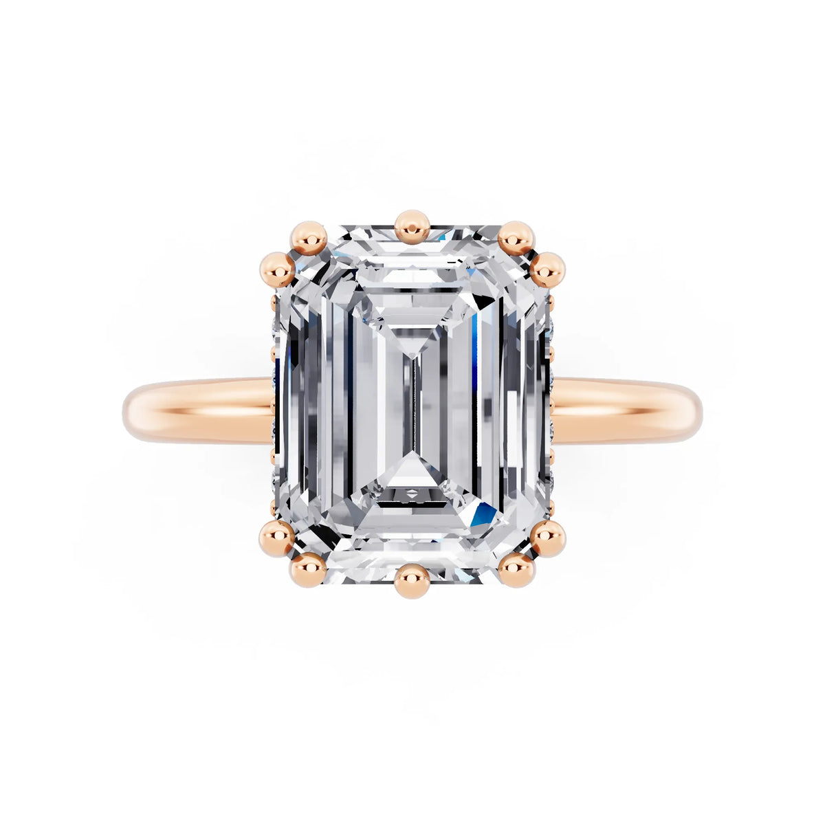 14 KT Rose Gold Emerald Cut Diamond Solitaire Ring with Hidden Accent Basket - top angle
