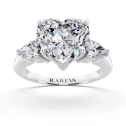 Platinum Heart Cut Diamond Three Stone Pear Accent Ring - front view