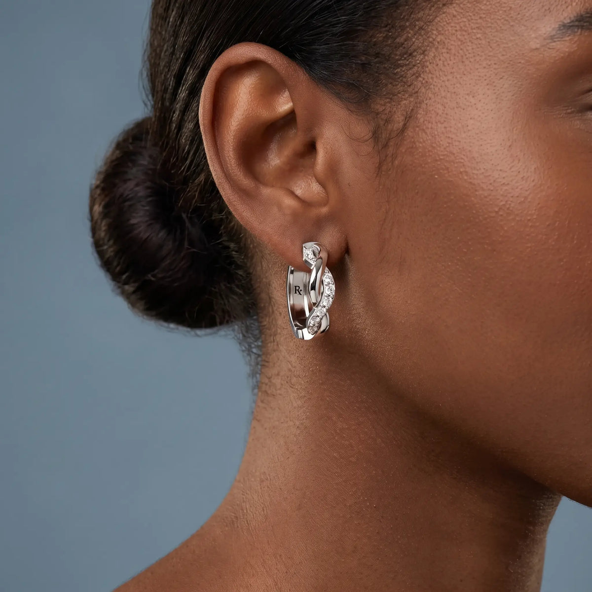 Silver Round Diamond Huggie Hoop Earrings - worn close up