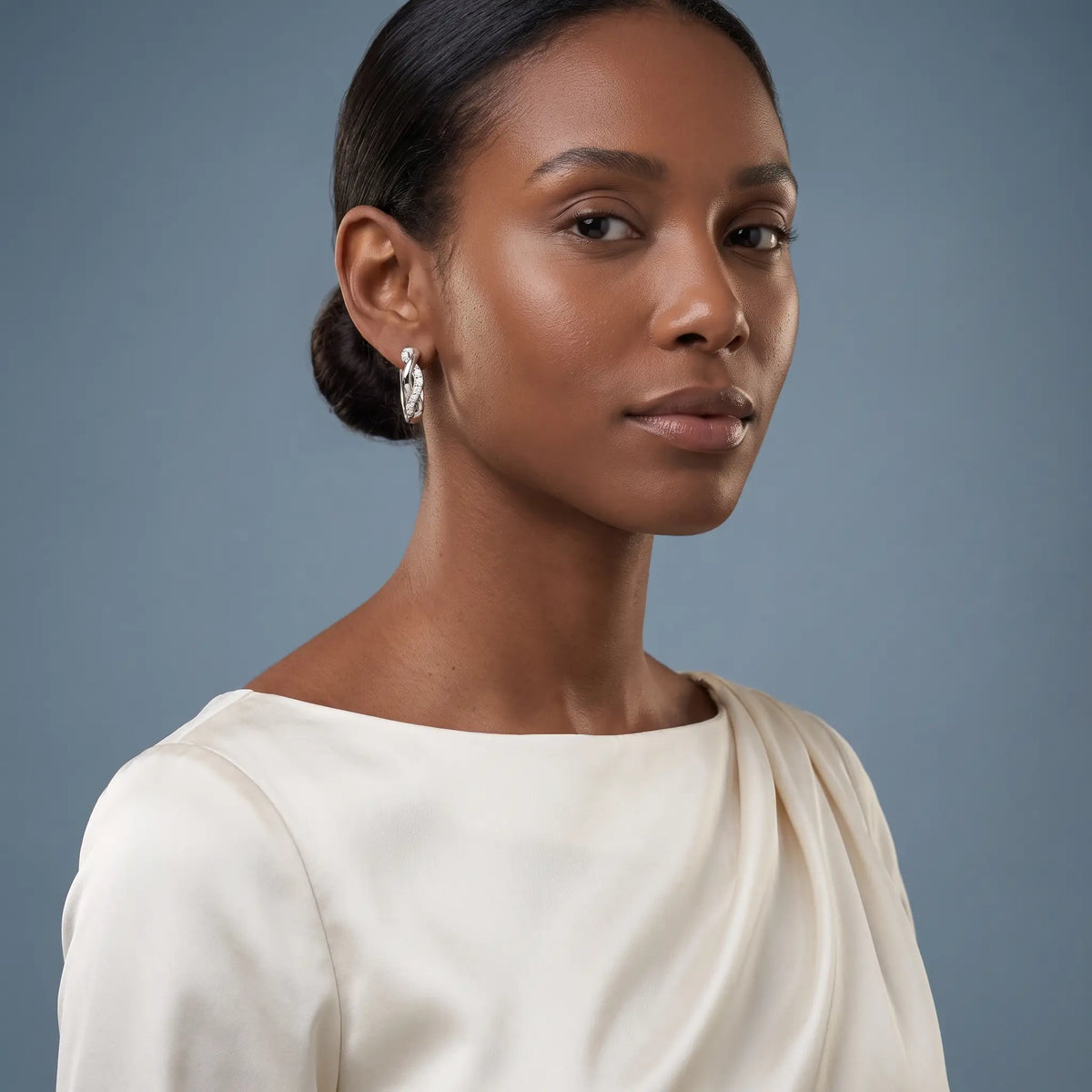 Platinum Round Diamond Huggie Hoop Earrings - model beauty shot