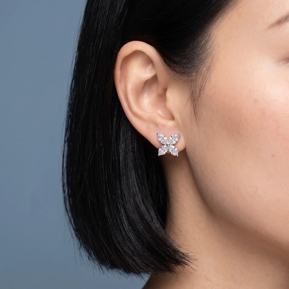 14KT Yellow Gold Diamond Butterfly Earrings - worn close up