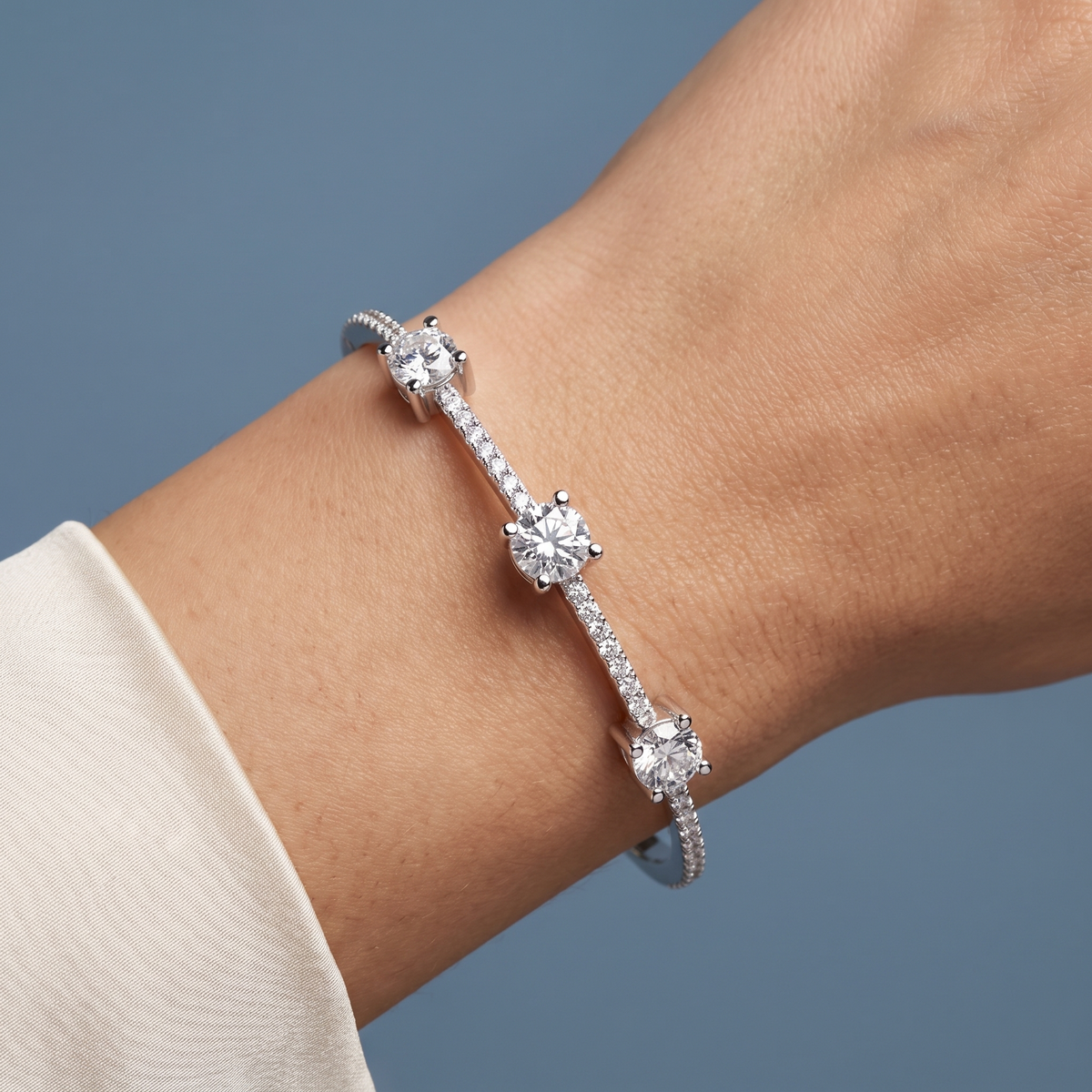 10K White Gold Three Stone Round Cut Diamond Bangle Bracelet - Close-up