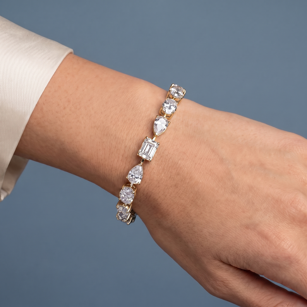 14K Yellow Gold Oval Pear and Emerald Cut Diamond Tennis Bracelet - Close-up