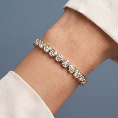 10K Yellow Gold Round Cut Bezel Set Diamond Tennis Bracelet - Close-up