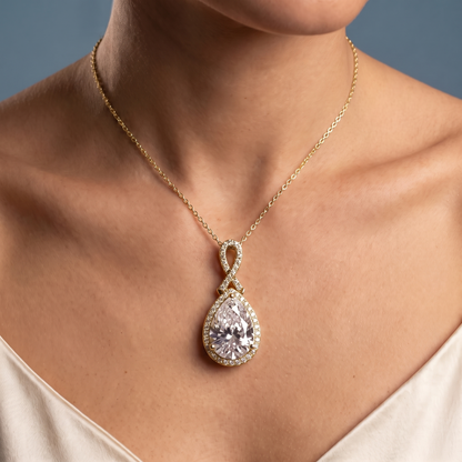 10KT Yellow Gold Pear Diamond Halo Infinity Bail Pendant - Close-up