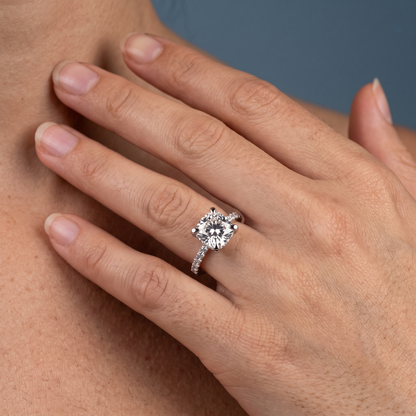 Platinum Cushion Cut Diamond Solitaire Ring - worn close-up