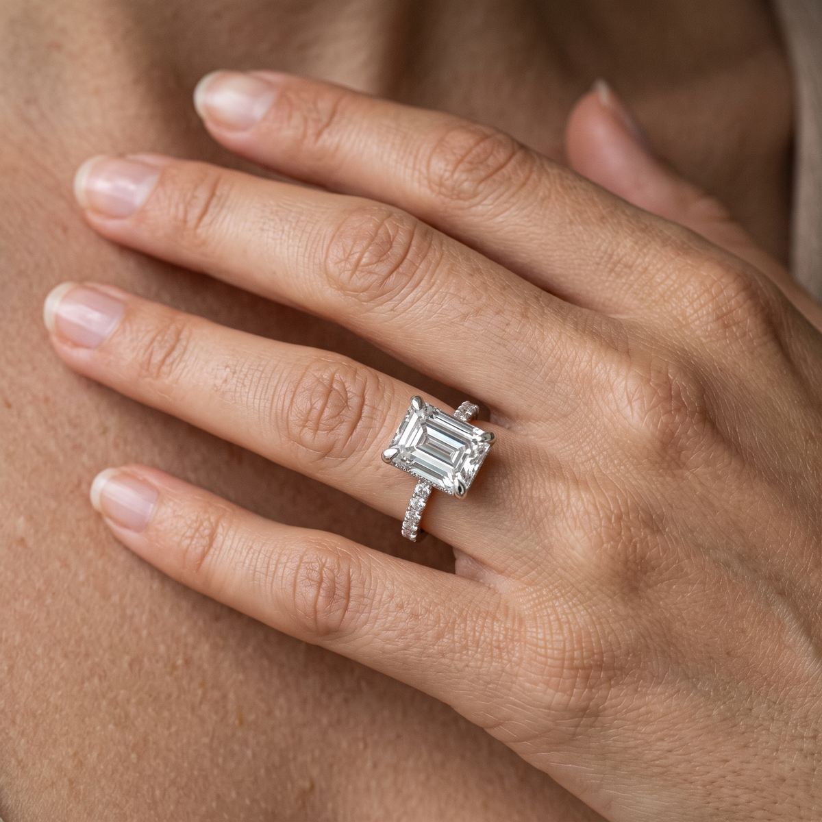 14 KT White Gold Emerald Cut Diamond Solitaire Ring - worn close-up
