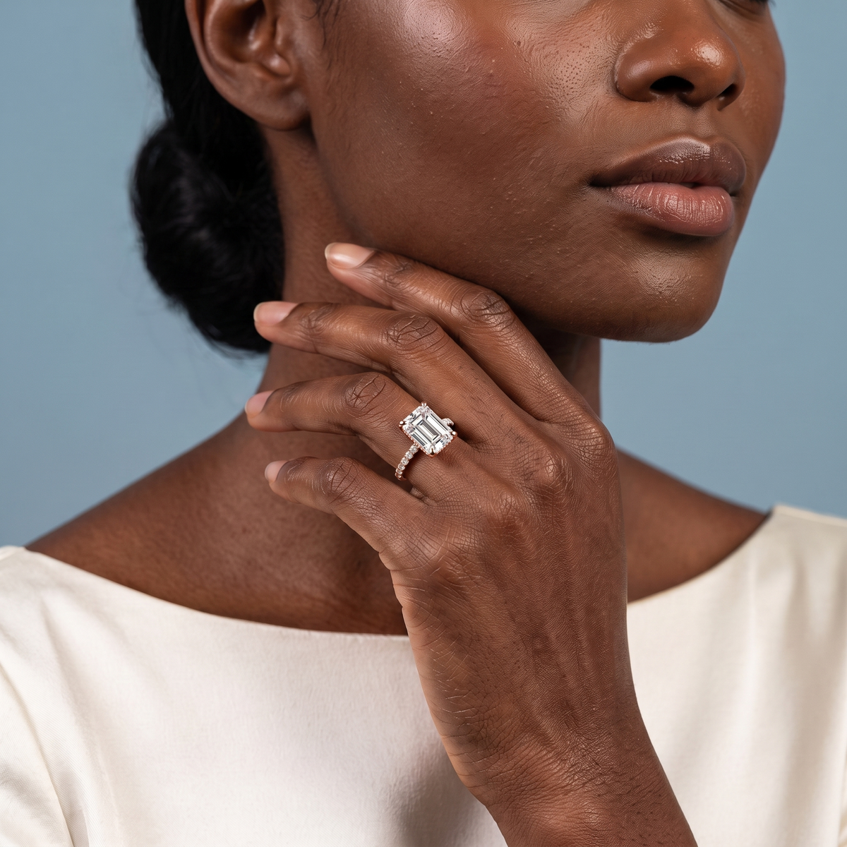 14 KT Rose Gold Emerald Cut Diamond Solitaire Ring - model beauty shot