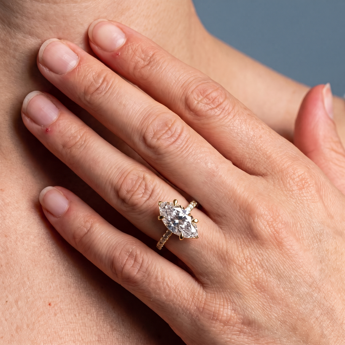 18 KT Yellow Gold Marquise Cut Diamond Solitaire Ring - worn close-up