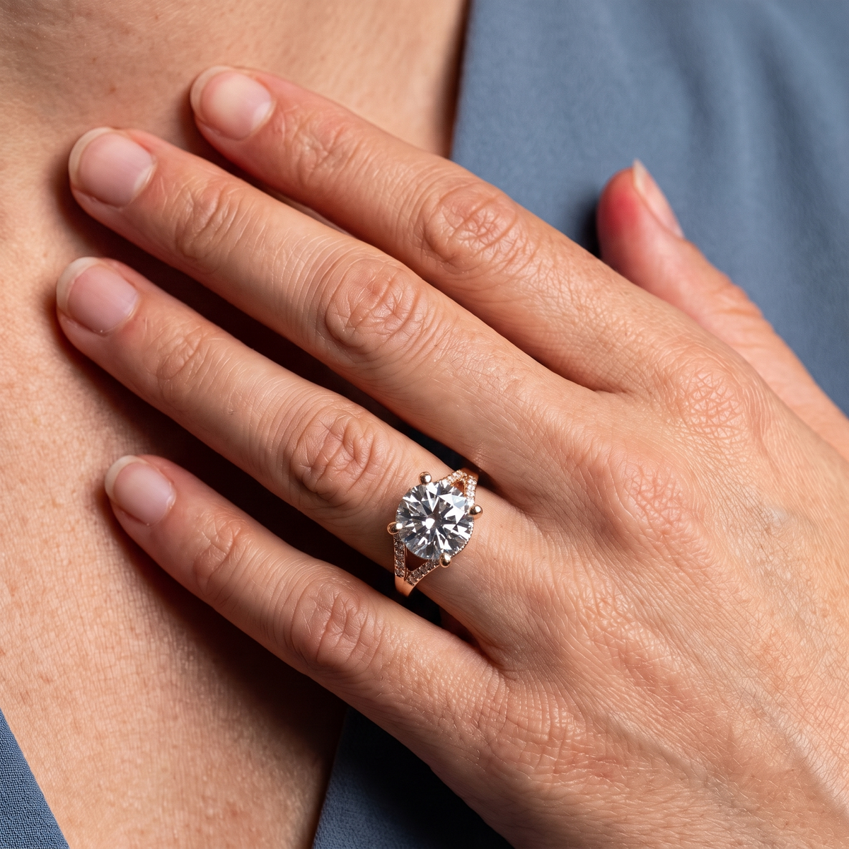 14 KT Rose Gold Round Cut Diamond Split Shank Engagement Ring with Hidden Halo - worn close-up