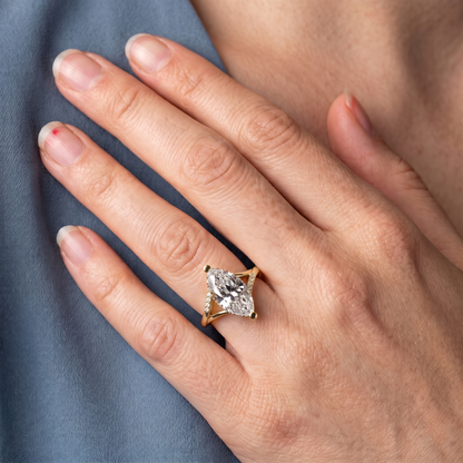 14 KT Yellow Gold Marquise Cut Diamond Split Shank Engagement Ring with Hidden Halo - worn close-up