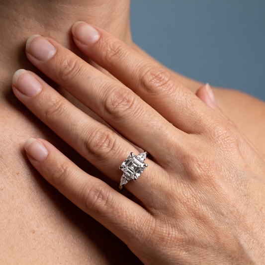 Platinum Asscher Cut Diamond Cluster Engagement Ring with Pear Accents - worn close-up
