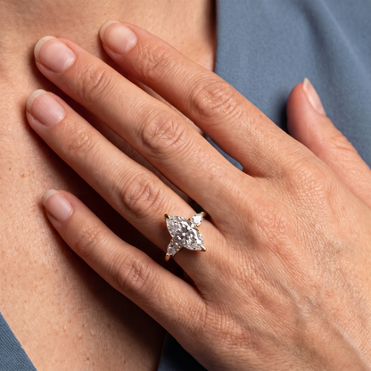 14 KT Yellow Gold Marquise Cut Diamond Cluster Engagement Ring with Pear Accents - worn close-up