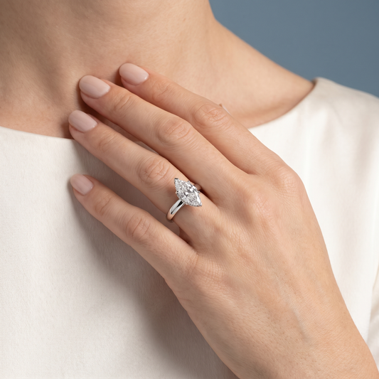 14 KT White Gold Marquise Cut Diamond Hidden Halo Solitaire Ring - worn close-up