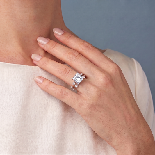 18 KT Rose Gold Princess Cut Diamond Ring with Floating Accent Band - worn close-up
