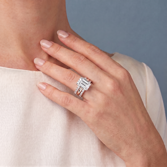 18 KT Rose Gold Emerald Cut Diamond Solitaire Twin Pave Band Stack Ring - worn close-up