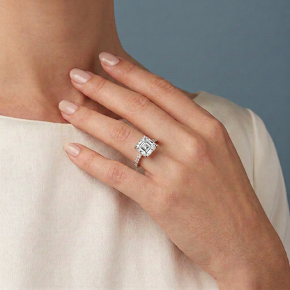 14 KT Rose Gold Asscher Cut Diamond Hidden Halo Ring with Pave Shank - worn close-up