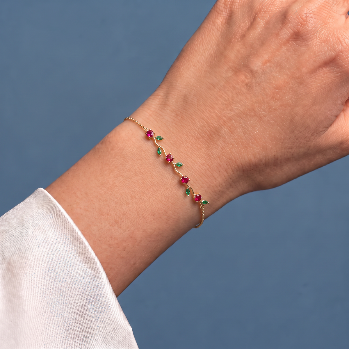 10K Yellow Gold Lab Grown Ruby Emerald Vine Bracelet - Close-up