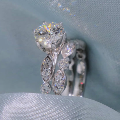 Round Cut Diamond Solitaire Ring with Marquise Motif Band - Video