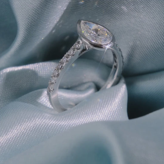 Pear Cut Diamond Bezel Set Ring with Pave Band - Video